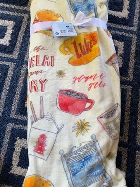 Gilmore Girls Luke's Diner Cream Printed Plush Throw Blanket